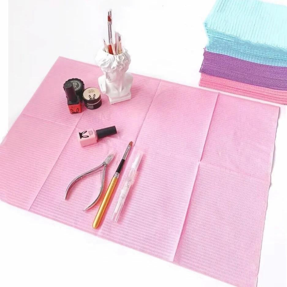Paquete de 125 unidades de mantel desechable para uñas impremeable